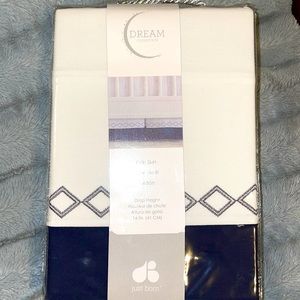 Just Born crib skirt Brand New in original packaging! Navy and White